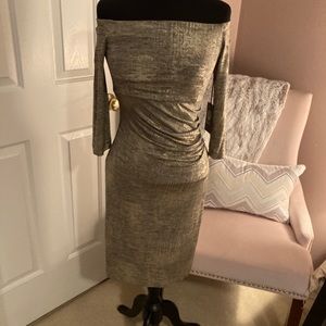 Gold off shoulder fitted dress